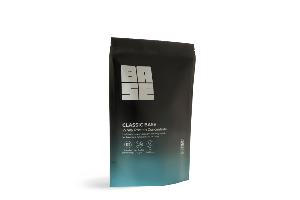 Black and blue protein powder package with 'Base' branding on a white background